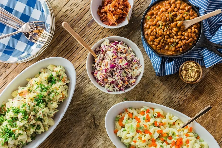 coleslaw, mc and cheese, potato salad and bake beans