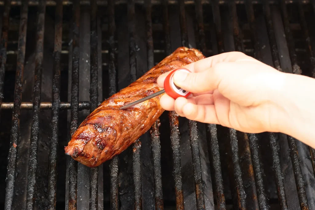 How to Grill the Best Pork Loin in a Traeger Checking the porkloin