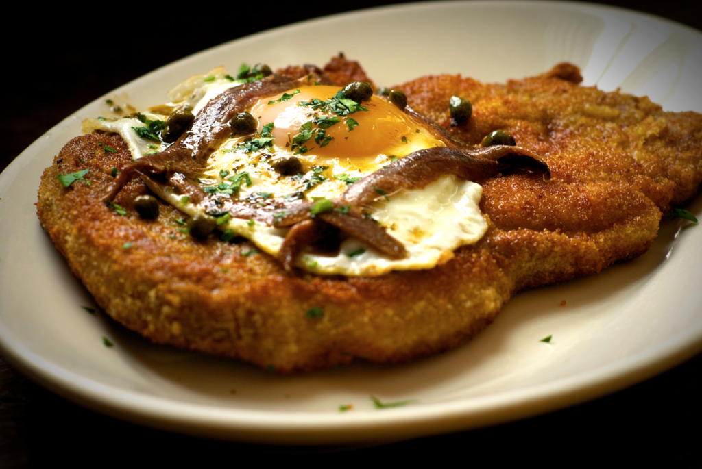 Schnitzel a la Holstein: Similar to milanesa