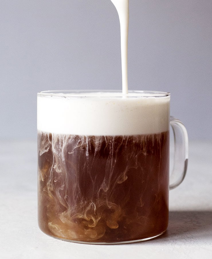 Grab that can of whipped cream and crown your Hojicha Latte
