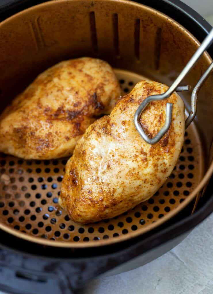 Frozen Chicken Breast Air Fryer Method give them a gentle flip halfway through the cooking time