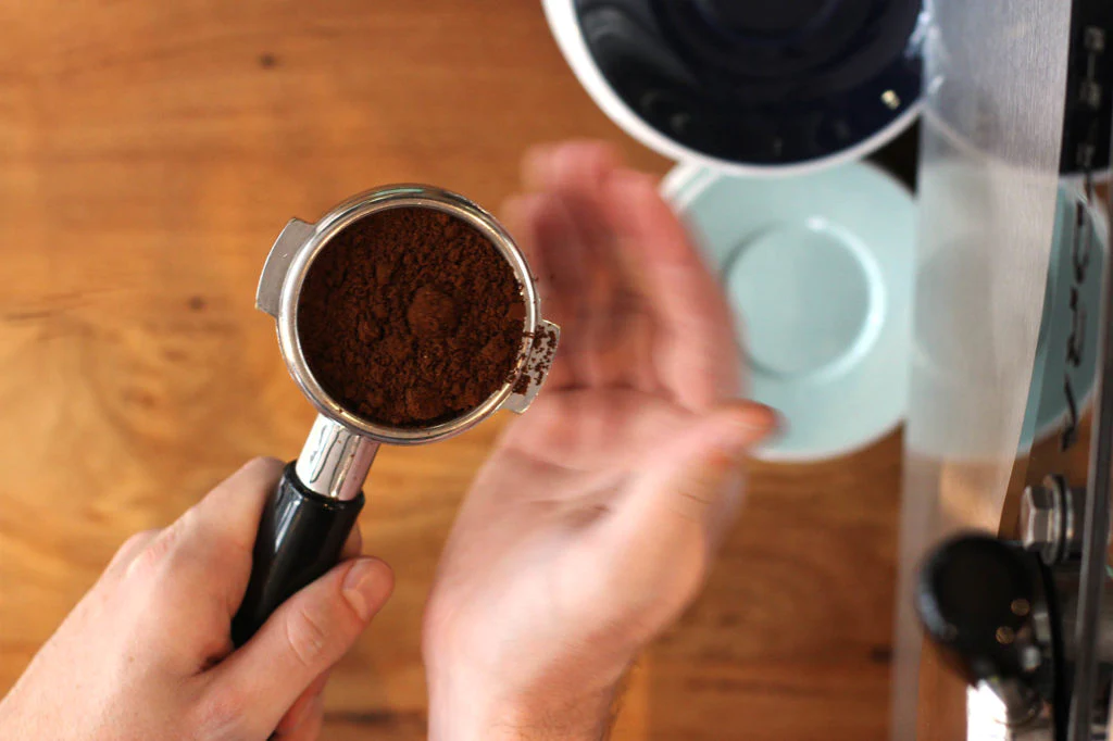 Step-by-Step Instructions to Perfect Coffee Ground Distribution gently tap the sides of the portafilter to settle the coffee grounds