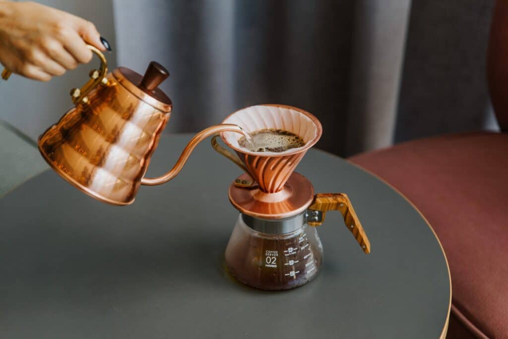 Pouring water in drip coffee