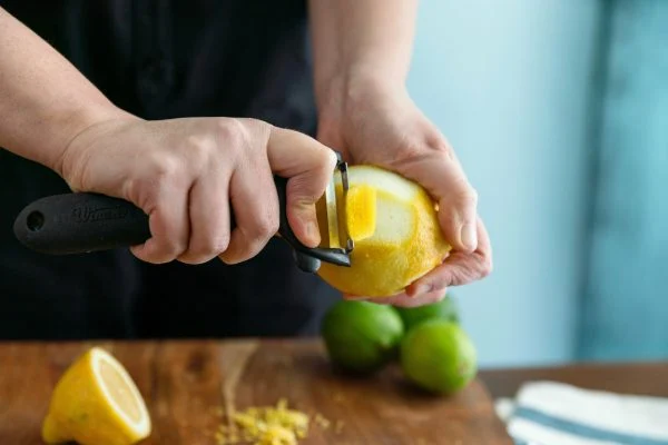 Prepare and putting garnish in bourbon mixing